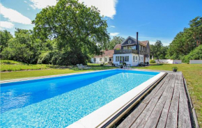 Amazing home in Borrby with Outdoor swimming pool, WiFi and Heated swimming pool, Borrby